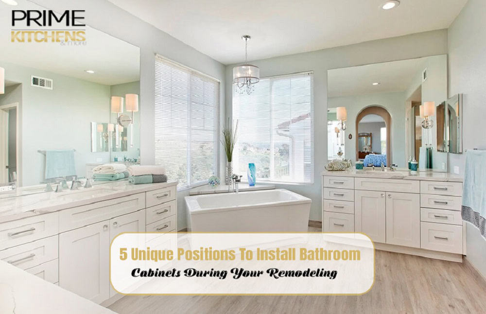 A modern bathroom with large mirrors, white cabinets, and a central bathtub surrounded by large windows. Two vanities with sinks and white countertops are on either side of the bathtub. Text reads, "5 Unique Positions To Install Bathroom Cabinets During Your Remodeling," courtesy of Remodeling Services Orlando Florida.